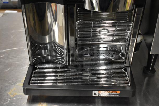 Stainless steel commercial espresso machine, countertop model with hot water dispenser, 120/208-240V, brand new condition.
