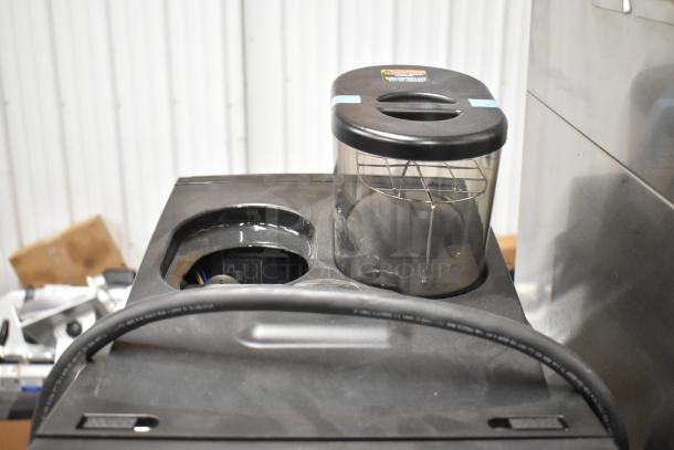 Brand new stainless steel commercial espresso machine with hot water dispenser, 120/208-240V, 1 phase. Features durable build.