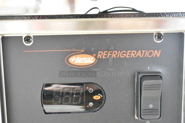 Hatco FTB-3 control panel with branding, display, and switch, part of a stainless steel commercial frost top.