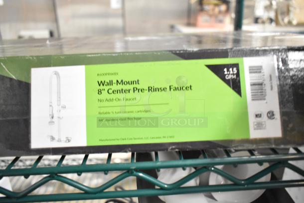 Brand new Regency 600PRW8X 1.15 GPM wall-mounted pre-rinse faucet with 8" centers, 44" hose, ceramic cartridges. Box shown.