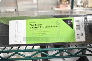 Brand new Regency 600PRW8X 1.15 GPM wall-mounted pre-rinse faucet with 8" centers, 44" hose, ceramic cartridges. Box shown.