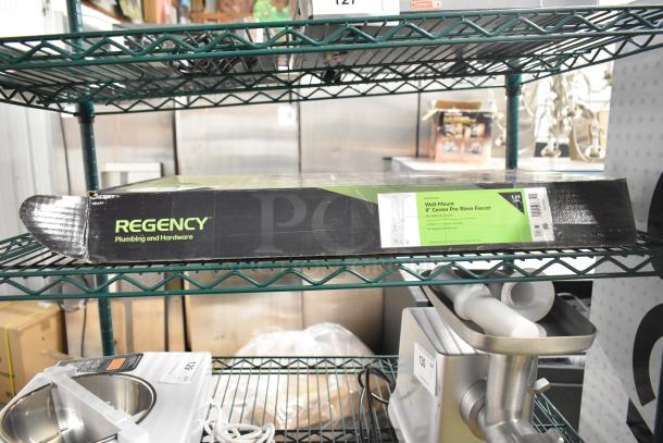 Boxed Regency 600PRW8X wall-mounted pre-rinse faucet, 1.15 GPM, 8" centers, 44" hose, brand new, slight box damage.