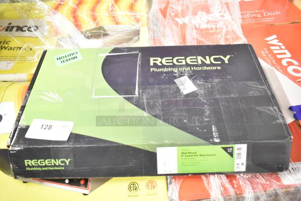 Brand new Regency 600PRW8X pre-rinse faucet, 1.15 GPM, 8" centers, 44" hose, scratch and dent condition in box.