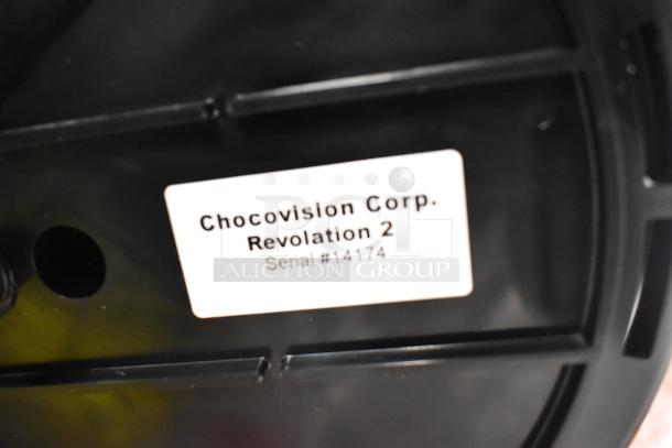 ChocoVision Revolation 2 tempering machine, model C116USREV2WHI. Serial #14174 label on black surface.