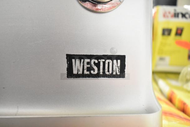 Brand new Weston Pro Series #12 Electric Meat Grinder, model 33-1301-W, with visible scratch and dent, 120V, 1 phase.