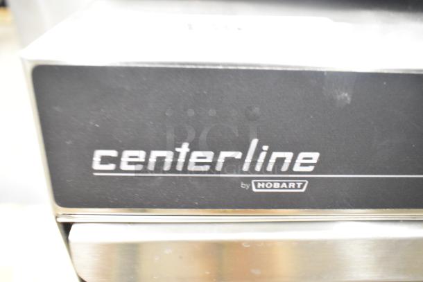 Brand new Hobart Centerline CUH-1 stainless steel commercial dishwasher, high temp, 208-240V, 1 phase.