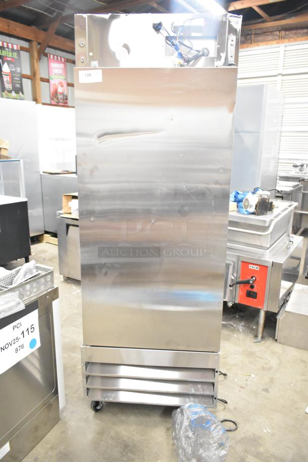 Brand new 2024 Mainstreet 829BMR23F stainless steel single door freezer with poly-coated racks, slight dent, on casters.