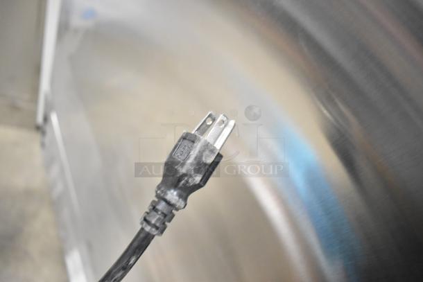 Close-up of power cord for Mainstreet 829BMR23F stainless steel commercial freezer. New condition despite minor scratches.