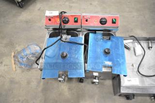 BRAND NEW SCRATCH AND DENT! Avantco F202 30 lb. Dual Tank Medium-Duty Electric Countertop Fryer w/ 2 Metal Lids and 2 Metal Fry Baskets. 208-240 Volts, 1 Phase. - Item #1225167