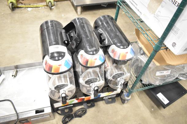 BRAND NEW Vollrath VCBF168-37 stainless steel commercial triple 2.6-gallon frozen beverage machine. Includes visible scratch and dent. 115 volts, 1 phase.