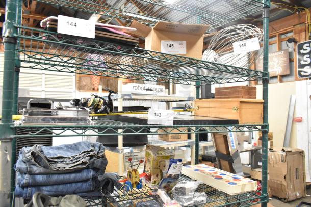 Auction tier lot with various items, including a fishing rod, wooden boxes, electronics, tools, and clothing on metal shelves. Tags show numbers 143-147.