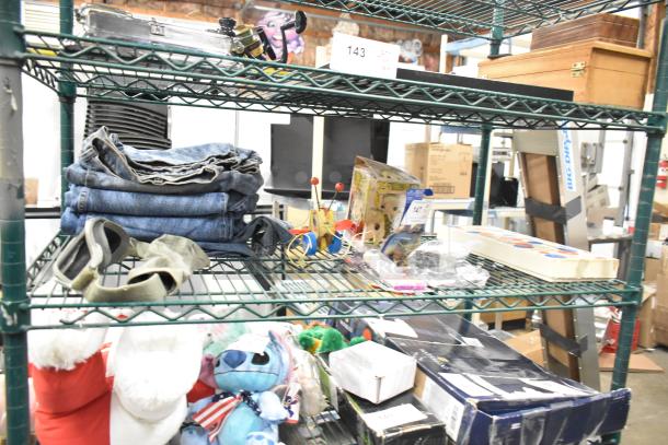 Tier lot with HP1195748 Southbend igniter, HP1195448 flame sensor, jeans stack, Pez dispenser, and assorted items.