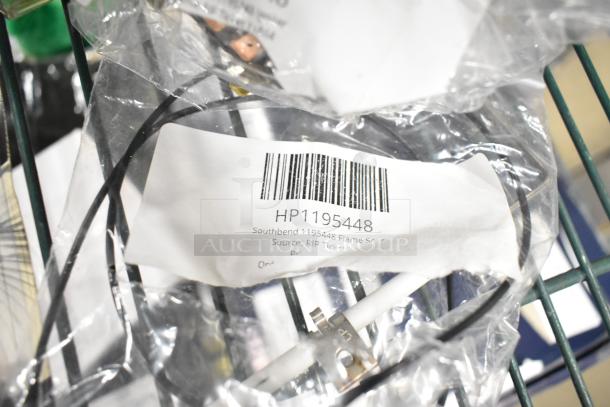 Tier lot including Southbend 1195448 Flame Sensor in packaging. Barcoded label visible. Mixed items included.