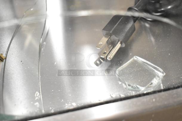 Broken glass and power cord of a new Hoshizaki HNC-120BA-R-SLH sushi display case, stainless steel, 47", 115V, right side compressor.