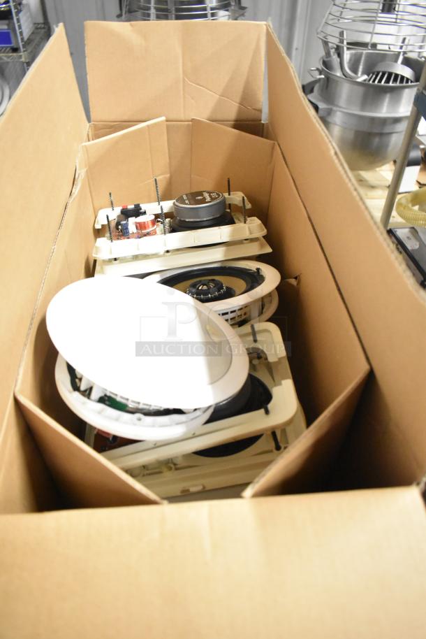 Box of Control 126WT in-wall loudspeakers, unpacked, showcasing components. Good condition, ideal for audio installations.
