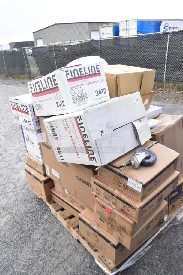 Palette containing boxes of Fineline crystal tumblers and wine glasses. Items are brand new, some with scratch and dent condition.