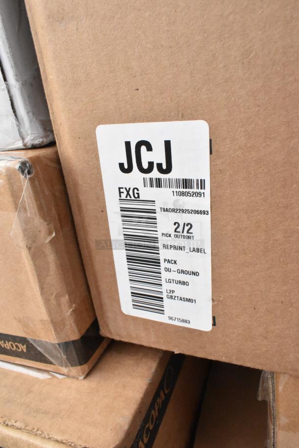 Cardboard box with shipping label "JCJ FXG" including barcode and item codes. Contains glasses and tumblers, scratch and dent condition.