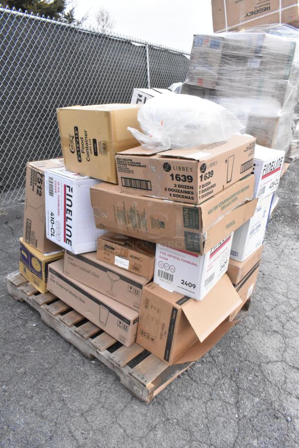 Pallet with 27 new scratch and dent items, including glasses and plastic tumblers. Various brands in original boxes.