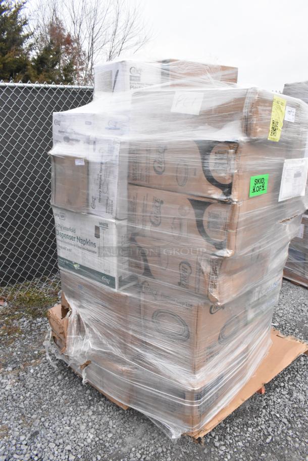 Pallet with shrink-wrapped boxes of brand new scratch and dent items, including meat trays, trash bags, and more.