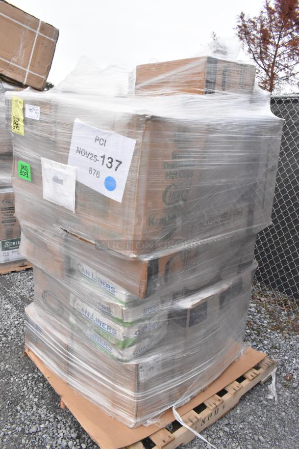 Pallet of 31 assorted scratch and dent items including meat trays, trash bags, teaspoons, and cups, wrapped and labeled for auction.