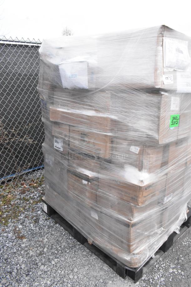 Pallet of 42 new scratch and dent items, wrapped in plastic, including lids and trays. Various box labels visible.