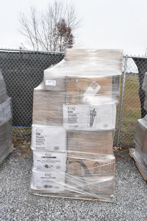 Pallet of 26 new scratch-and-dent items including trash bags, cold cups, T-shirt bags, and plastic cutlery packs, wrapped in plastic.