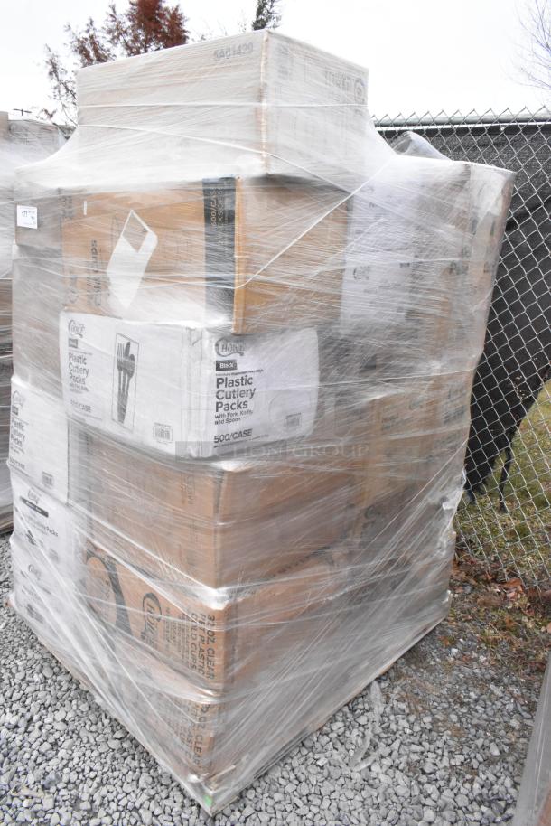 Pallet of 26 new scratch and dent items, including plastic cutlery packs, cold cups, and T-shirt bags, wrapped in plastic.