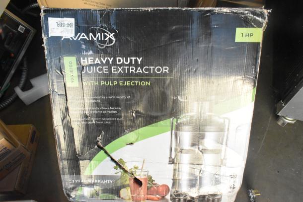 BRAND NEW AvaMix 928JE700 Metal Juice Extractor with Pulp Ejection in box, 120V, 1 Phase, label shows 1 HP and 1-year warranty.