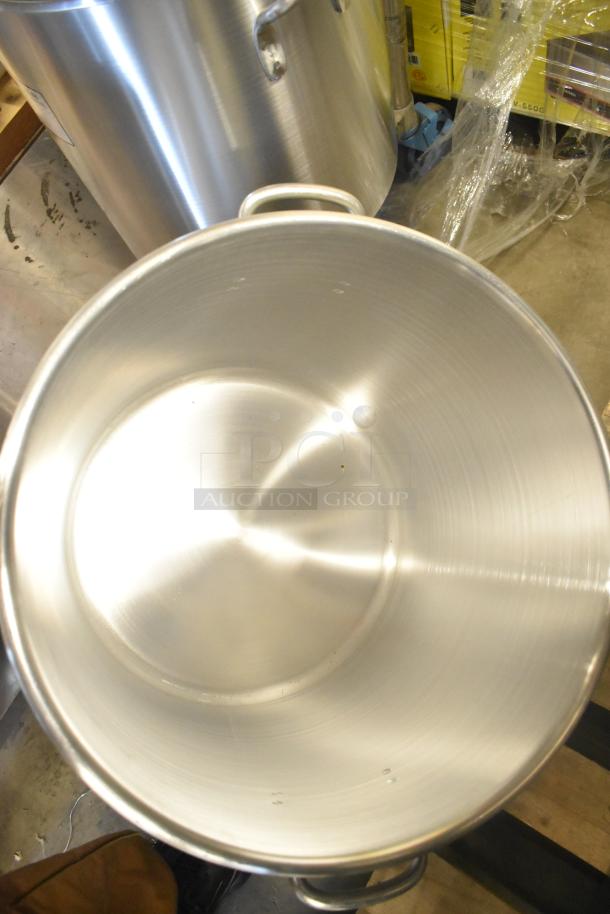 Three brand new Vollrath stainless steel stock pots, polished finish, sturdy handles. Ideal for large batch cooking.