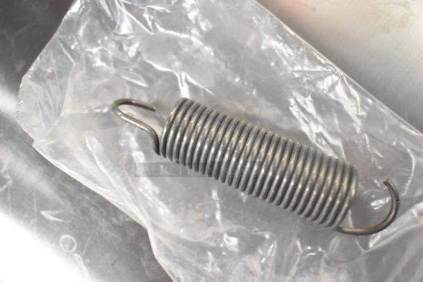 Brand new metal coil in packaging, part of a set including thermostatic control and basket. Auction item details unknown.