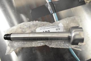 Brand new stainless steel immersion blender blade with slight scratches. Comes with protective bubble wrap.