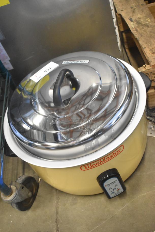 Brand new RiceMaster 57155 rice cooker, 110 cup capacity. Features stainless lid, caution label. 230V, scratch and dent.