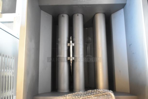 Vulcan LG300-2 stainless steel propane deep fryer, 90,000 BTU, new condition with metal fry baskets, interior view.