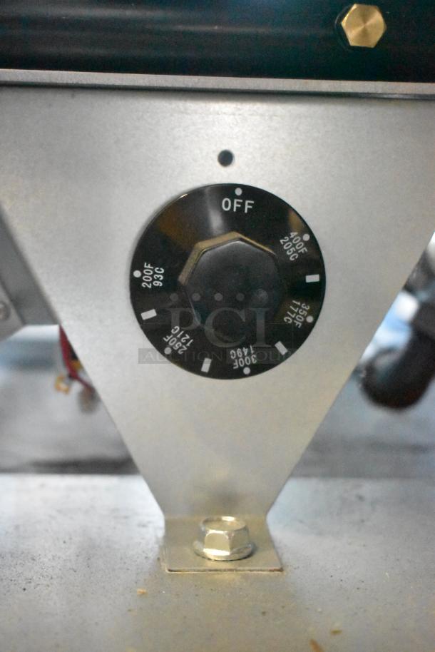 Close-up of temperature control dial on Vulcan LG300-2 commercial fryer showing temperature range.