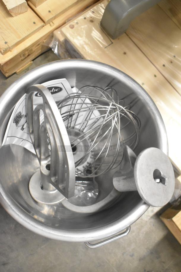 Brand new 2023 Globe SP20 20 Quart Planetary Dough Mixer with bowl, guard, dough hook, whisk, and paddle attachments.