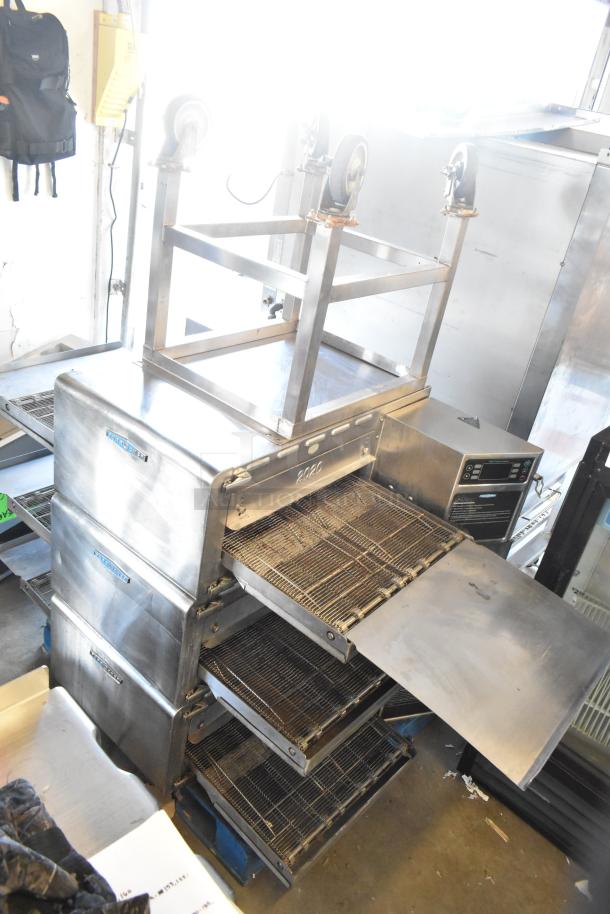 3 Turbochef HhC2020 stainless steel rapid cook conveyor ovens with stand and casters. 208/240V, 3-phase.