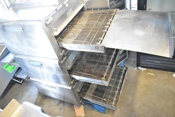 3 Turbochef HhC2020 stainless steel rapid cook conveyor ovens with stand on casters, 208/240V, 3-phase, usable condition.