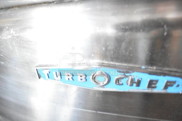 Turbochef HhC2020 stainless steel conveyor oven label, showcasing brand and model.