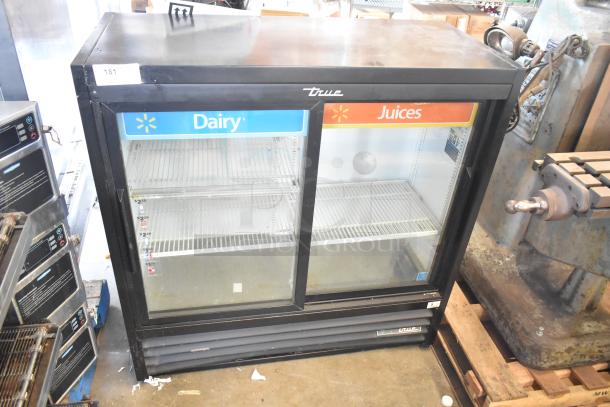 2019 True TBB-24-60G-HC-LD 2-door cooler merchandiser with poly-coated racks, "Dairy" and "Juices" labels, black metal finish.