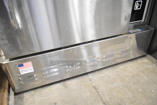 Blodgett stainless steel commercial gas convection oven, half size, solid door, featuring metal racks and thermostatic controls. Made in USA.