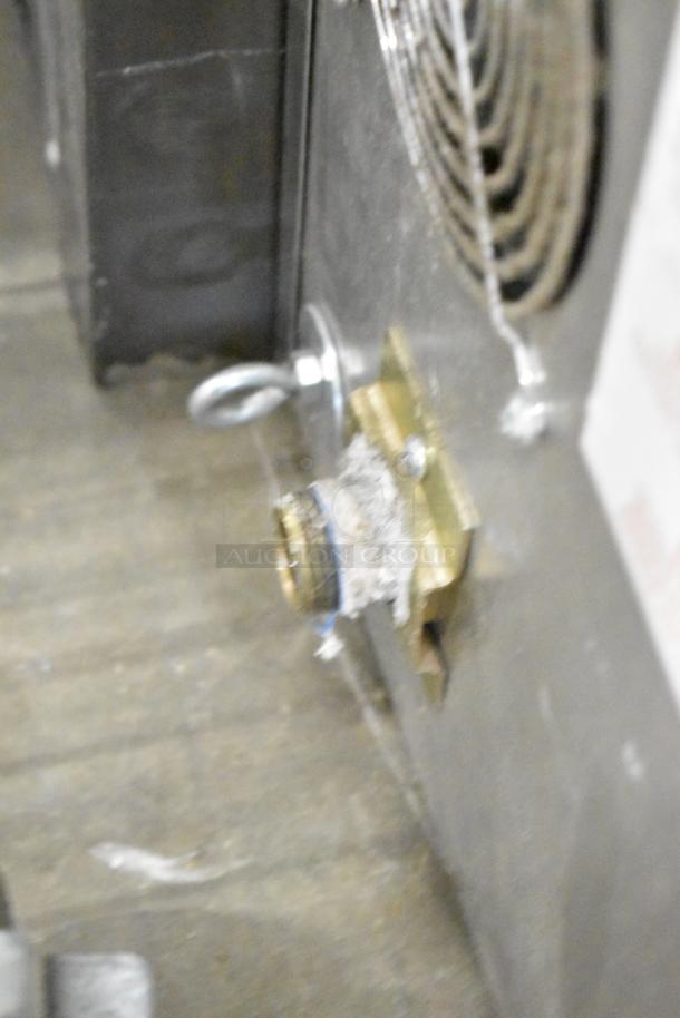 Blodgett stainless steel gas convection oven with solid door, metal racks, and thermostatic controls; commercial-grade.