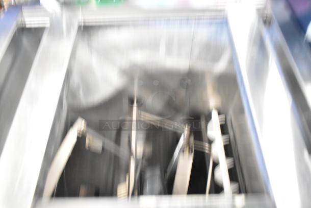 2022 Lancer TP 30 countertop carbonated beverage machine. Metal finish, 115 volts, 1 phase. Blurry interior view.