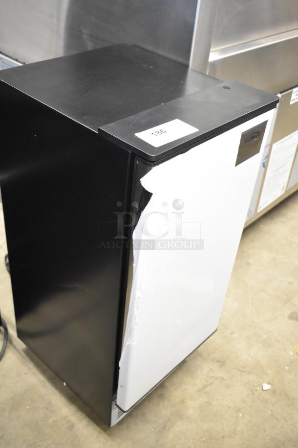 KoolMore BIM75-BS stainless-steel ice maker, 75lbs/24h, new scratch-and-dent condition, 115 volts, model tag visible.