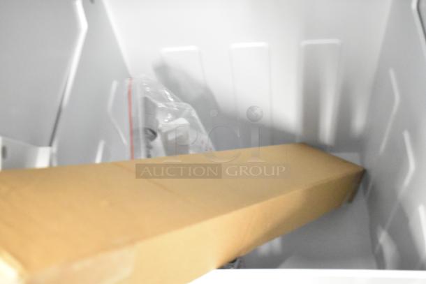 Interior of KoolMore BIM75-BS ice maker showing packaging materials. Brand new, scratch and dent condition.