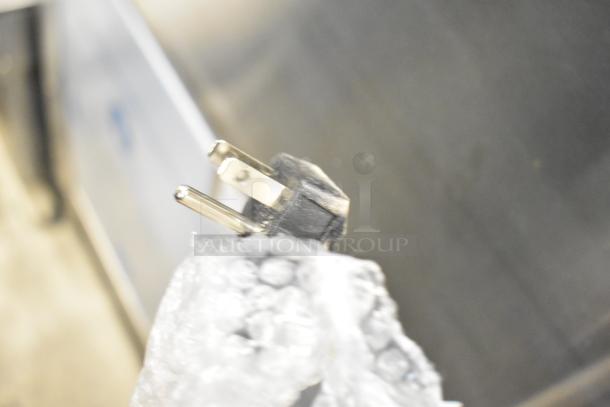 KoolMore BIM75-BS ice maker plug wrapped in bubble wrap, highlighting new condition. 115 Volts, ready for use.