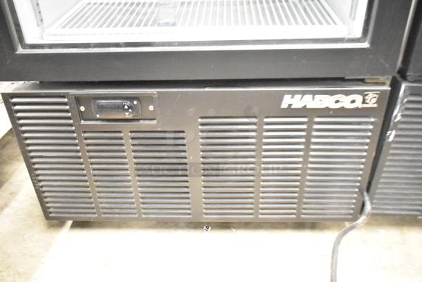 2019 Habco SE18 commercial cooler, single door, metal, poly coated racks, 115V, 1 phase, shown in good condition.