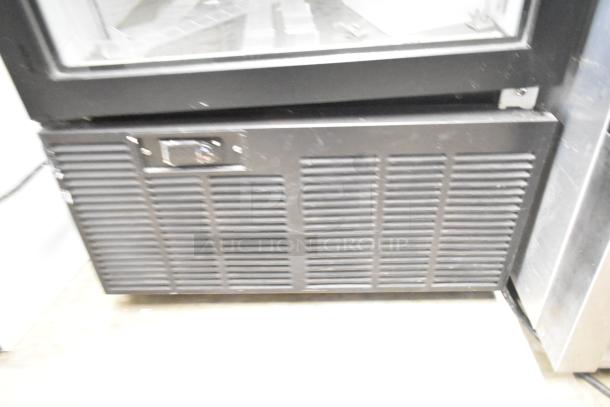 2019 Habco SE18 metal single door reach-in cooler with poly racks. 115 volts, 1 phase. Features vented panel.