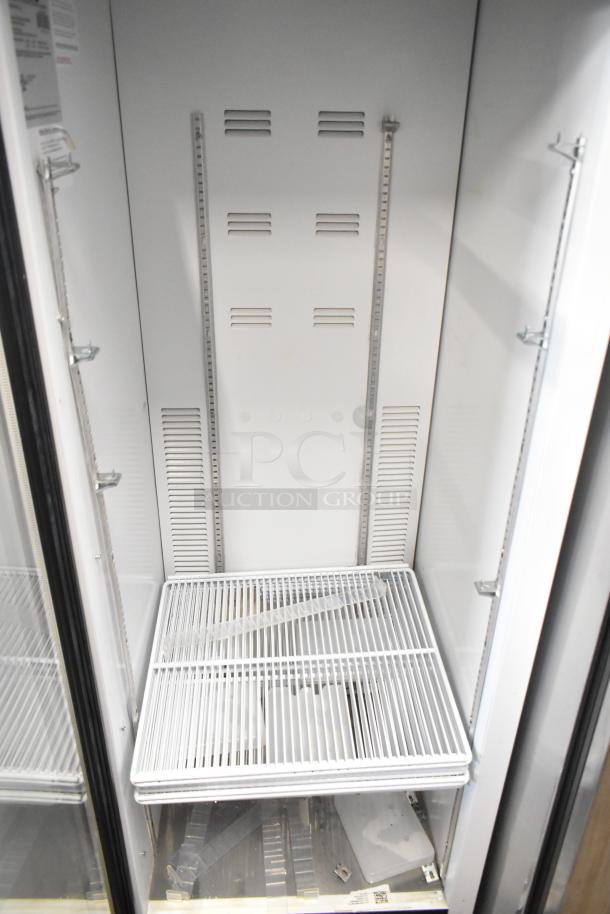 2019 Habco SE18 single door reach-in cooler with poly-coated racks, metal frame, 115 volts, 1 phase, excellent condition.