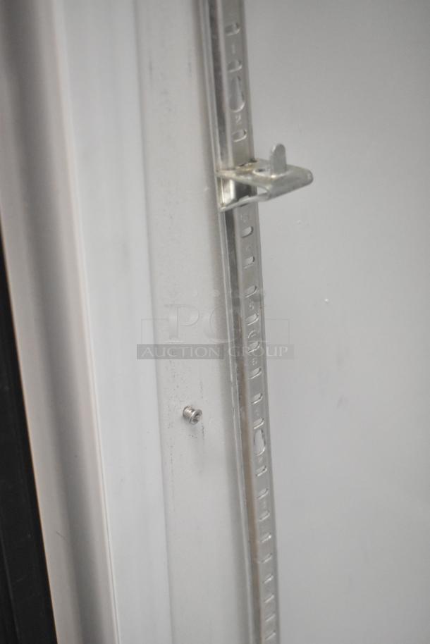 2019 Habco SE18 metal single door reach-in cooler interior view, showing rack mount. 115V, 1 phase, poly coated racks.