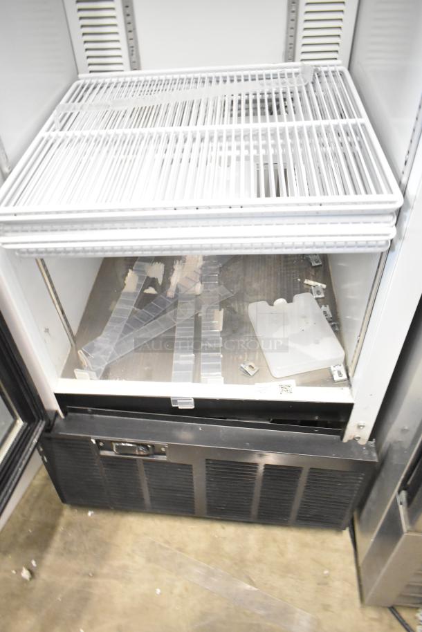 2019 Habco SE18 metal single door reach-in cooler with poly coated racks, electrical panel visible, good condition.
